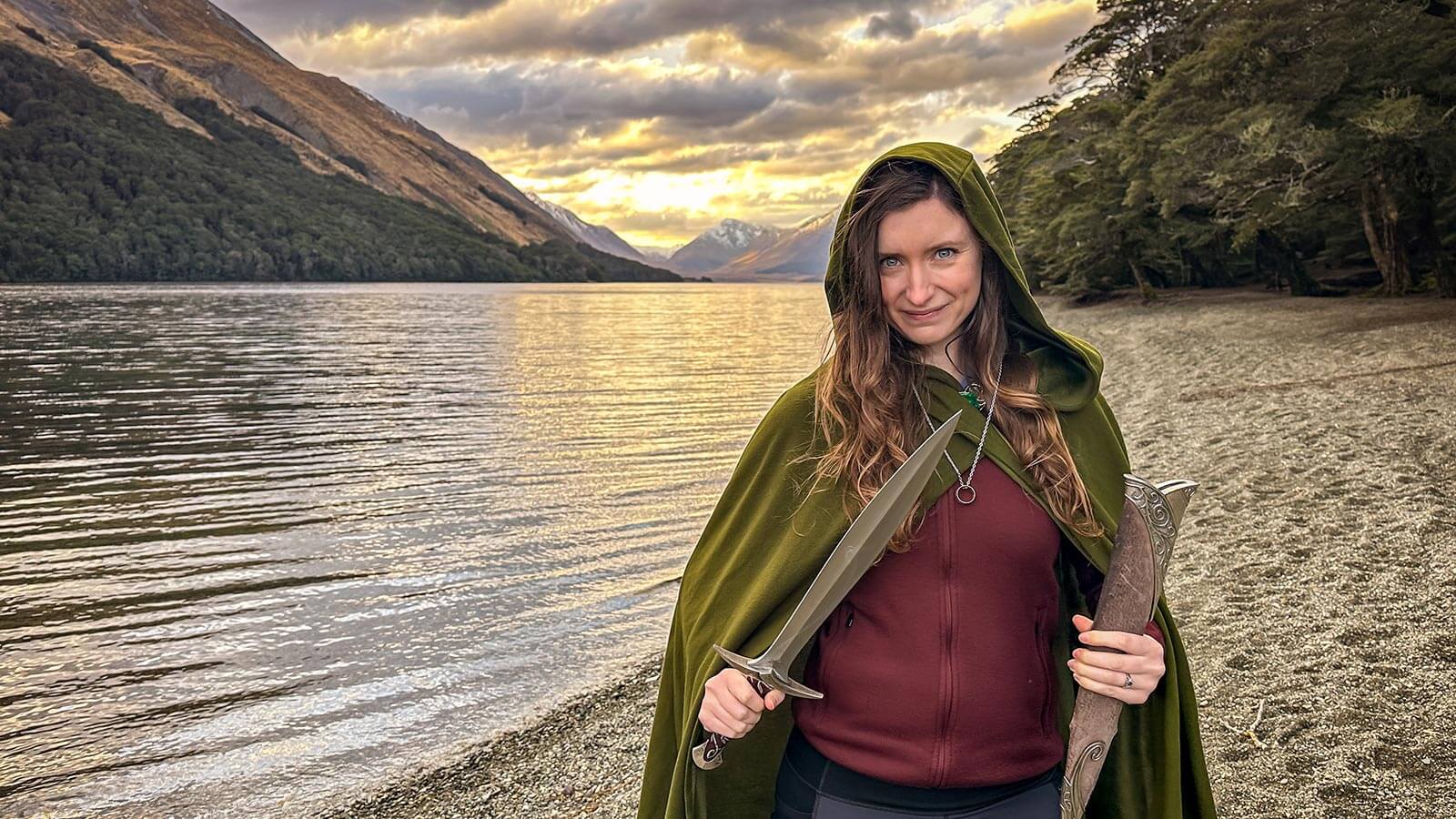 Woman role playing LOTR character on scenic lake front